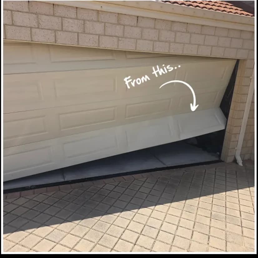 A sectional garage door buckled out of shape, the bottom panel pushed inward and the door sitting crooked in its opening